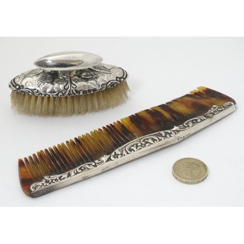 602 - A silver mounted nail brush hallmarked Birmingham 1899 maker Levi & Salaman together with a silver m... 