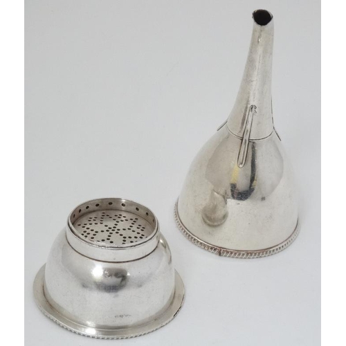 606 - A 19thC silver plated wine funnel with strainer section 6'' long