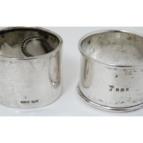 611A - 2 napkin rings, one hallmarked London 1918 maker Charles Boyton & Son Ltd. the other  Continental .8... 