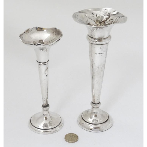 632 - A silver trumpet formed bud vase with flared rim, hallmarked Chester 1907 maker Martin Hall & Co. to... 