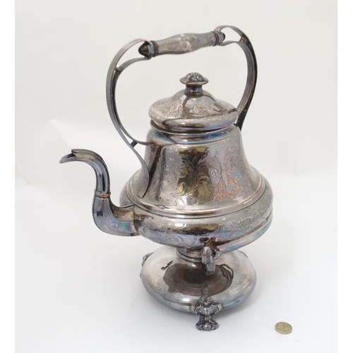 634 - A silver plated spirit kettle on stand with burner under. The whole approx 14 1/2'' high