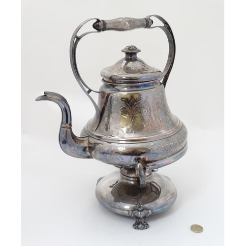 634 - A silver plated spirit kettle on stand with burner under. The whole approx 14 1/2'' high