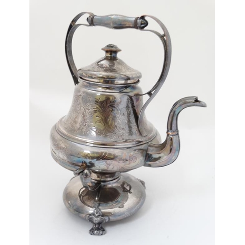 634 - A silver plated spirit kettle on stand with burner under. The whole approx 14 1/2'' high