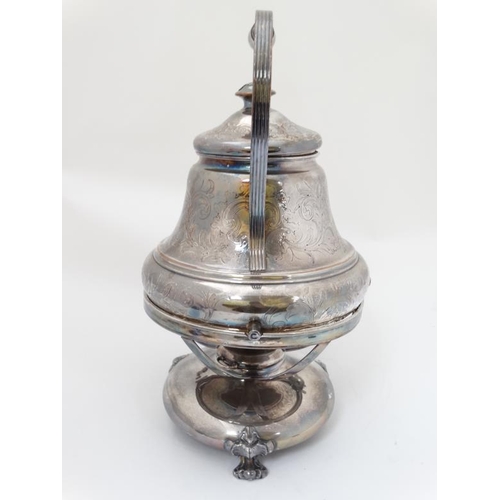 634 - A silver plated spirit kettle on stand with burner under. The whole approx 14 1/2'' high