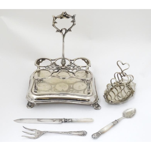 638 - Assorted silver plated wares comprising cruet frame / stand, toast rack, mother of pearl handled bre... 