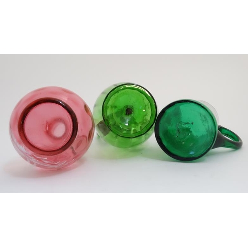 659 - Mary Gregory : 3 various items of Mary Gregory glass to include a cranberry glass jug, green glass j... 