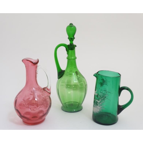 659 - Mary Gregory : 3 various items of Mary Gregory glass to include a cranberry glass jug, green glass j... 