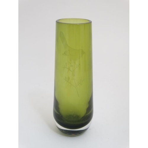 661 - A green glass art vase with etched bird decoration. Indistinctly signed under. 9'' high