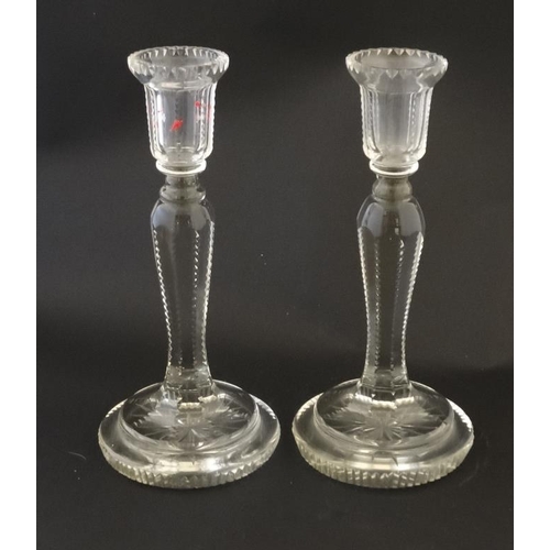 668 - A pair of cut glass candlesticks 8 1/2'' high