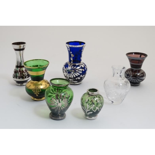 678 - 7 various small glass vases, many with silver lustre decoration. The tallest approx 4'' high