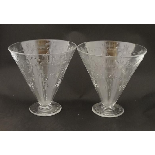 686 - A pair of 19thC / early 20thC pedestal vases of conical form with cut decoration approx 8 3/4'' high