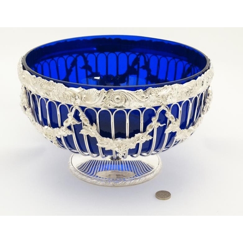 695 - A late 20thC / early 21st silver plated pedestal bowl with blue glass liner approx 11'' diameter  x ... 