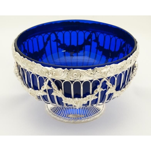 695 - A late 20thC / early 21st silver plated pedestal bowl with blue glass liner approx 11'' diameter  x ... 