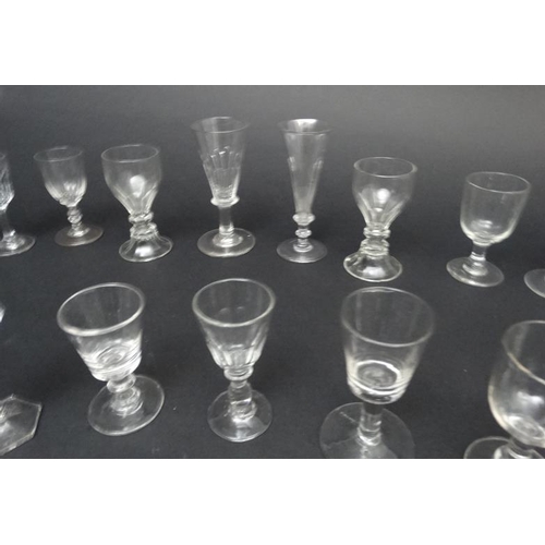 699 - A large quantity of assorted 19thC and 20thC glasses to include wine, custard , cordial glasses etc ... 