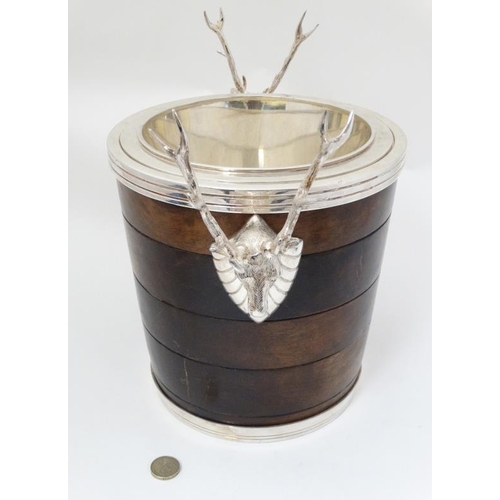 700 - A large silver plate ice/ champagne bucket / wine cooler with wooden banded decoration to outer and ... 