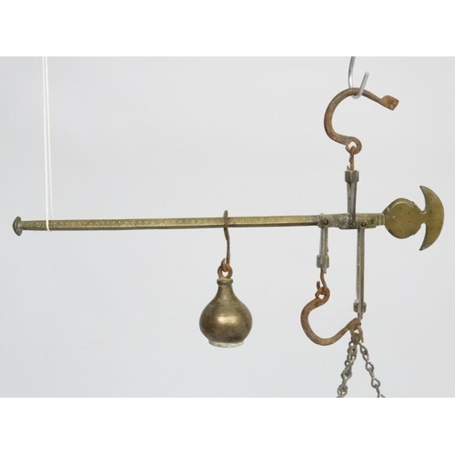 701 - Old brass hanging scales with large pan to one end and weight to other. The pan 14'' wide