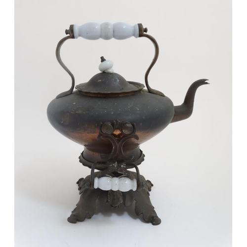 702 - A copper and brass spirit kettle and stand with white glass handles approx 14 1/2'' high