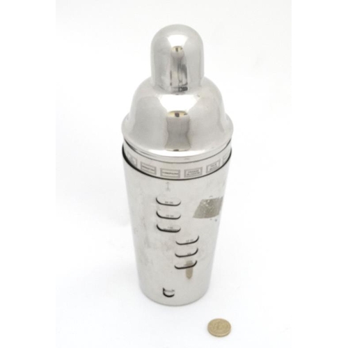 705 - A 21stC silver plated Stainless Steel Cocktail shaker with removable section showing menu constituen... 