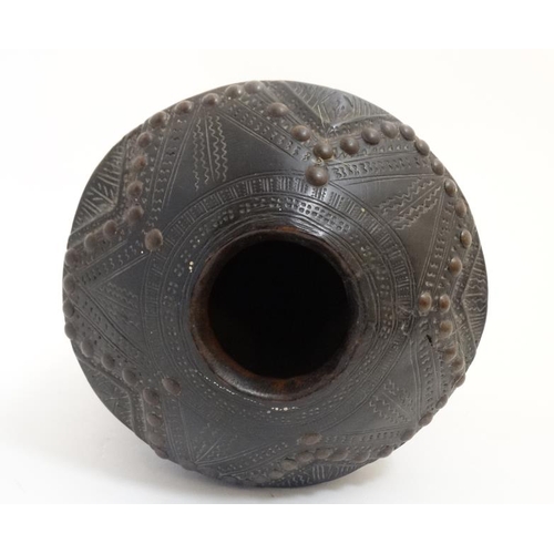 723 - Ethnographic Native Tribal : a sago like  carved wooden bowl with studded and scraffito like decorat... 