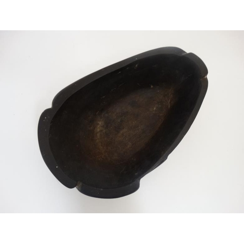 725 - Ethnographic Native Tribal : An African Ugandan carved wooden bowl with shaped decoration , 13 1/2''... 