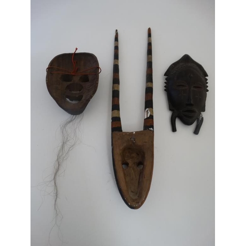 726 - Ethnographic Native Tribal : two assorted African wall masks , one with banded horns , the largest 2... 