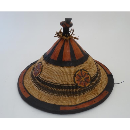 727 - Ethnographic Native Tribal :a South African hat from Lesotho , coloured with raffia like constructio... 