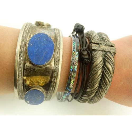 738 - Ethnographic Native Tribal :  five assorted African bracelets and bangle to include kapis lazuli inl... 