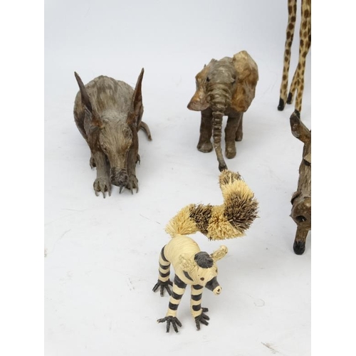 740 - Ethnographic Native Tribal : a quantity of 11 Zambian figures of wild animals including , giraffe, e... 