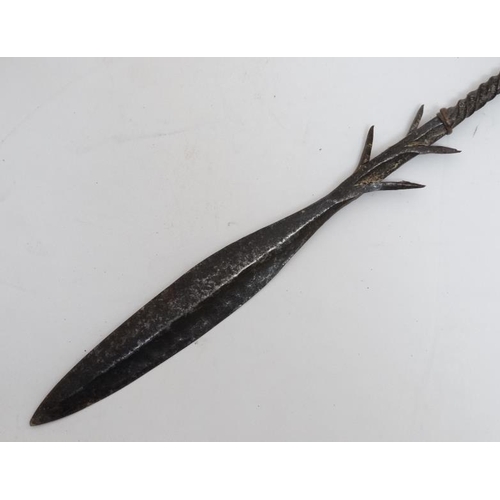 742 - Ethnographic Native tribal, an African hardwood shafted fishing spear measuring 52'' long