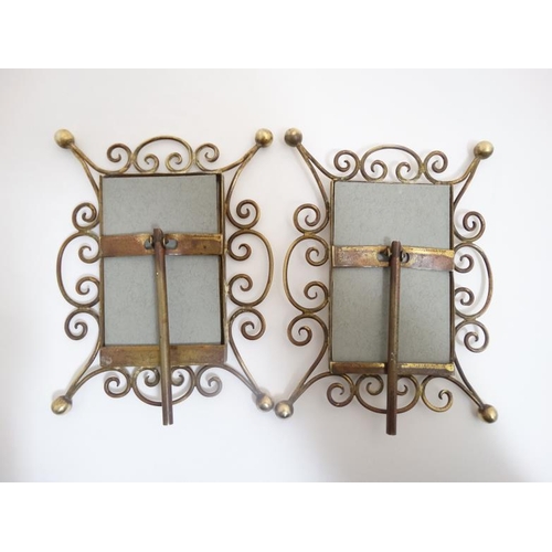 746 - A pair of Victorian brass easel / strut photograph frames 6 1/2'' high