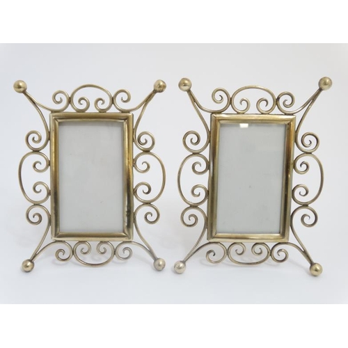 746 - A pair of Victorian brass easel / strut photograph frames 6 1/2'' high