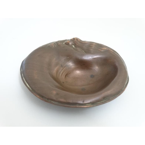 751 - A c.1909 Art Nouveau cast copper four footed circular tray. Marked with Registration number and 'Mad... 