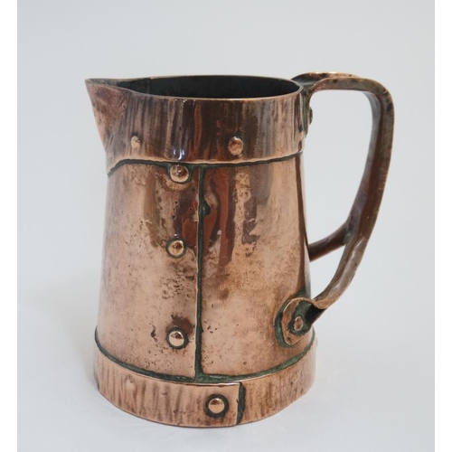 752 - A 19thC Arts and Crafts copper jug with sparrow beak future and  riveted decoration 3 3/4'' high