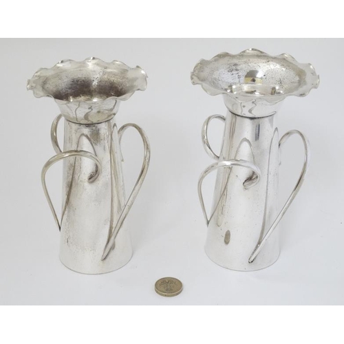 754 - Arts & Crafts : A pair of silver plate T&G vases marked under. 6 1/2'' high