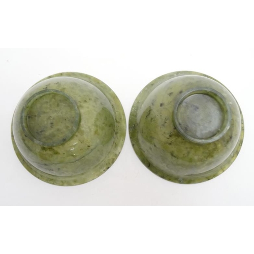 758 - A pair of Spinach green Chinese jade dishes/bowls approx 4'' diameter x 1 5/8'' high