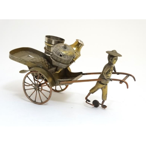 760 - A 19thC silver plated brass oriental rickshaw formed novelty cruet stand containing lidded basket, b... 