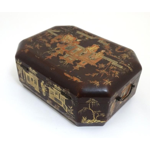 763 - An early 19thC brown lacquer ladies sewing / work box with gilt Chinoiserie decoration, having writi... 