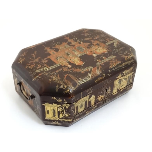 763 - An early 19thC brown lacquer ladies sewing / work box with gilt Chinoiserie decoration, having writi... 