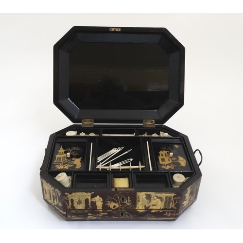 763 - An early 19thC brown lacquer ladies sewing / work box with gilt Chinoiserie decoration, having writi... 