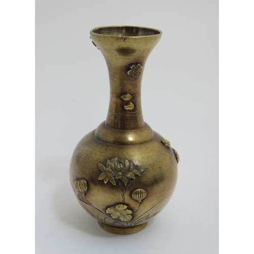 764 - A 19thC Japanese small vase with relief decoration standing 4 3/4'' high