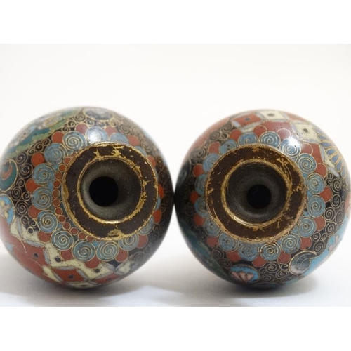 765 - A pair of Oriental cloisonne and gilt metal small baluster shaped vases 3 1/4'' high . (2)