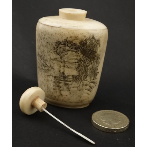 766 - An Oriental bone snuff bottle with script and image. 2 3/4'' High.