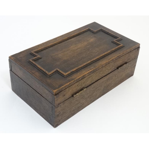 769 - An early 20thC oak box with geometric moulding to top marked  ' John ... 1914' within. 12'' wide x 4... 