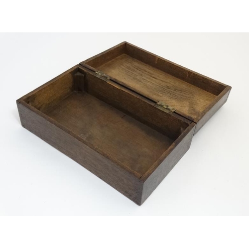 769 - An early 20thC oak box with geometric moulding to top marked  ' John ... 1914' within. 12'' wide x 4... 