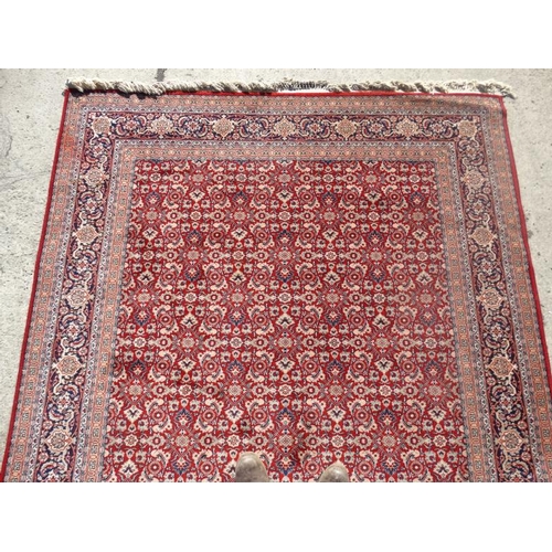 78 - Rug / Carpet : a 20 thC Belgian Wilton rug with 5 bands around a wine red central ground. 123 x 78 1... 