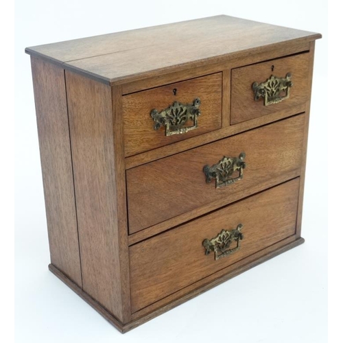 788 - An Edwardian and later walnut small chest of drawers comprising 2 short over 2 graduated long drawer... 