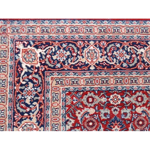 79 - Rug / Carpet :  a 20 thC Belgian Wilton rug with wine ground and 3 band borders,  100 x 65 1/2''