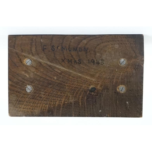 791 - A 1920's oak desk calendar having day date and month apertures 6 1/2'' high x 4 7/8'' wide