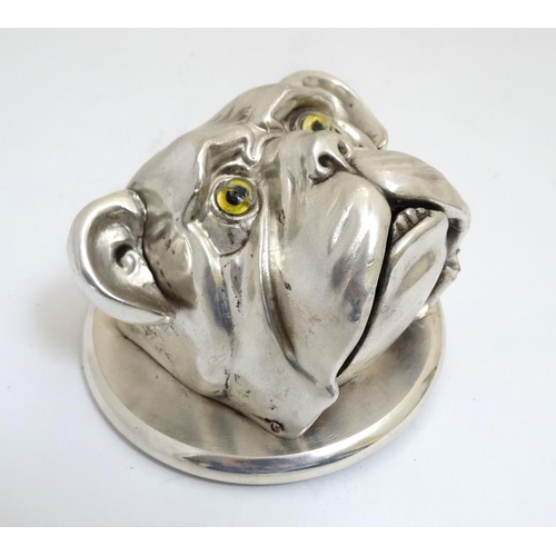 796 - A 21st silver plate novelty desk bell formed as a bulldogs head . The base 4 1/2'' diameter