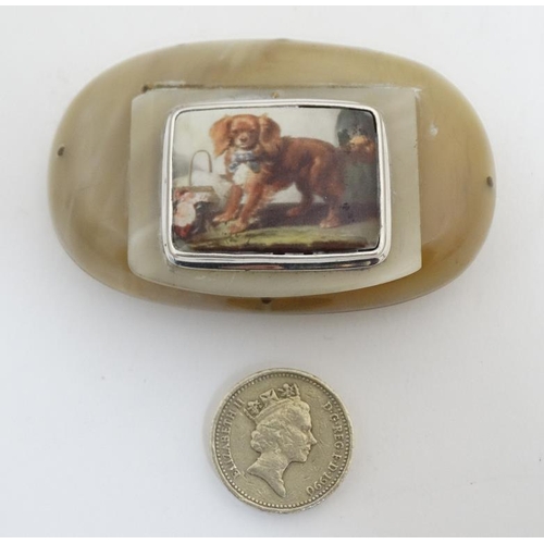 806 - *Withdrawn from Auction* A 19thC oval horn pocket snuff box with later applied image of a spaniel do... 